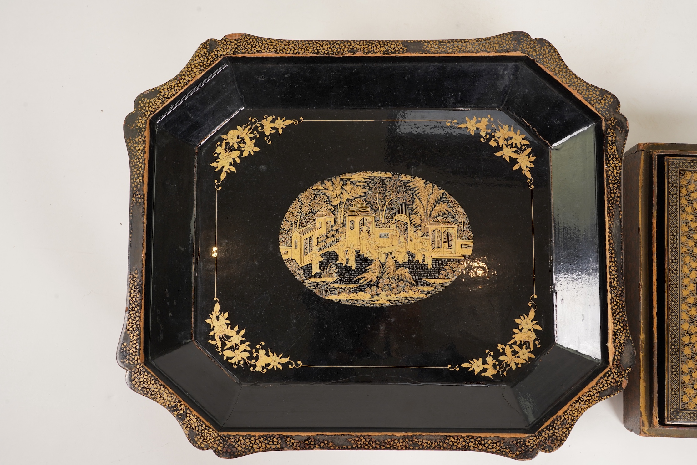 Two Chinese gilt decorated black lacquer games boxes, containing numerous mother-of-pearl counters, 19th century